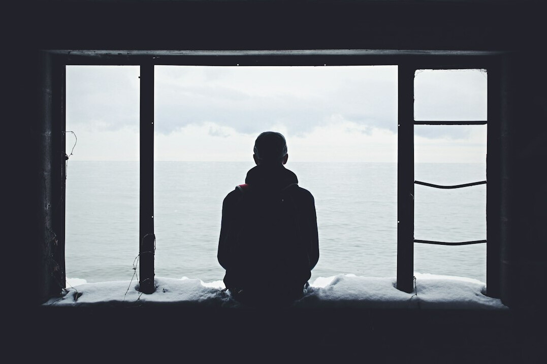 person thinking alone